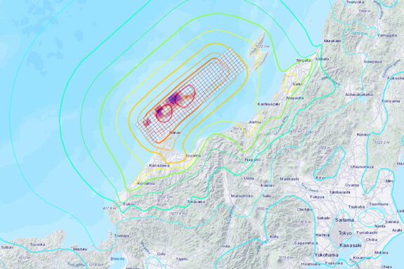 A map of a section of Japan, including the Noto Peninsula, showing two pieces of information: one, the intensity of the January 1st earthquake getting smaller further away from the epicenter found off the coast of the Peninsula, and two, the slip amplitude, which has two intense clusters near the epicenter of 6 meters.