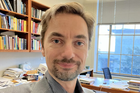 A selfie of Laurent Demanet in his office.